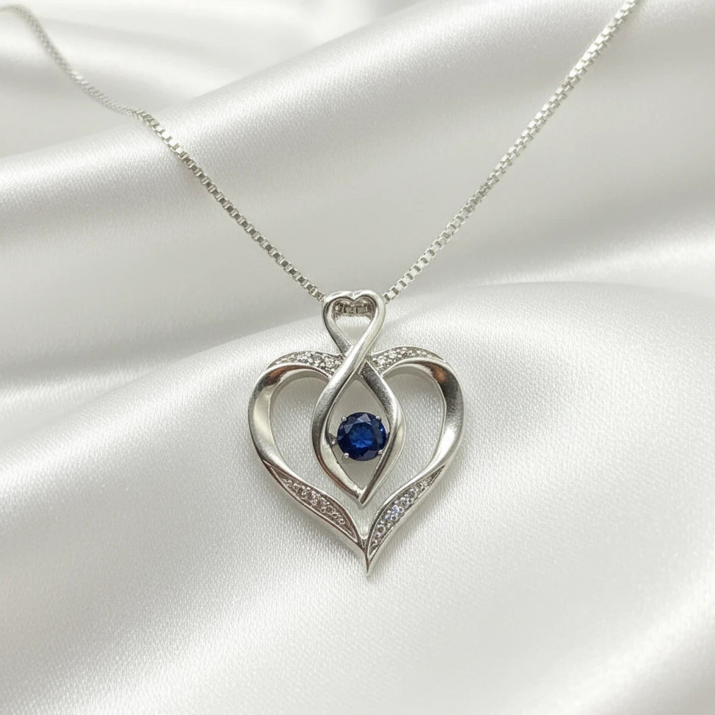 Sterling Silver Heart Pendant with Floating Sapphire