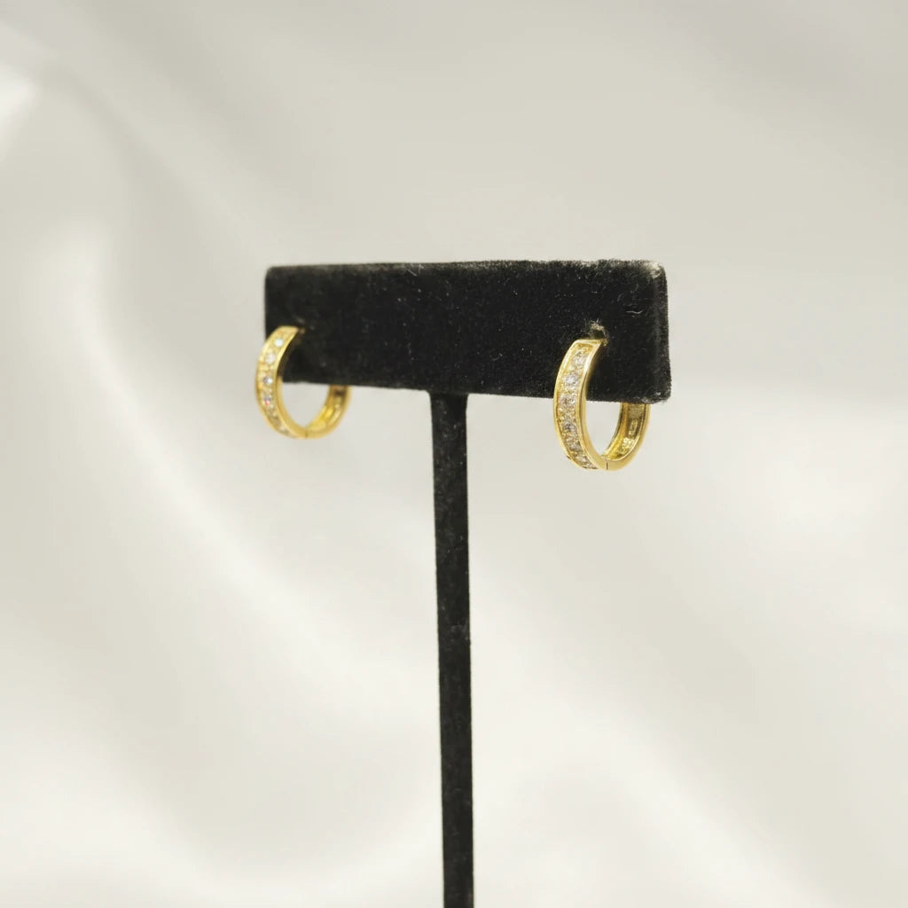 10k single row cz huggie earrings